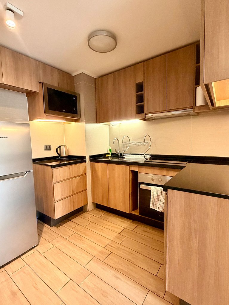 A pasos de Clinica: Parking + Cama King + Wifi